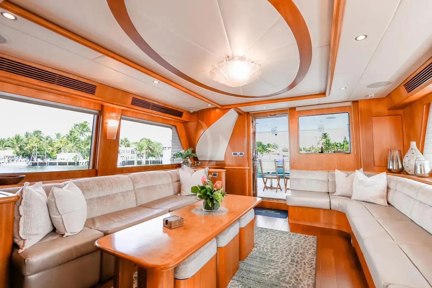 a living room with a couch and a table aboard ANDIAMO Yacht for Charter