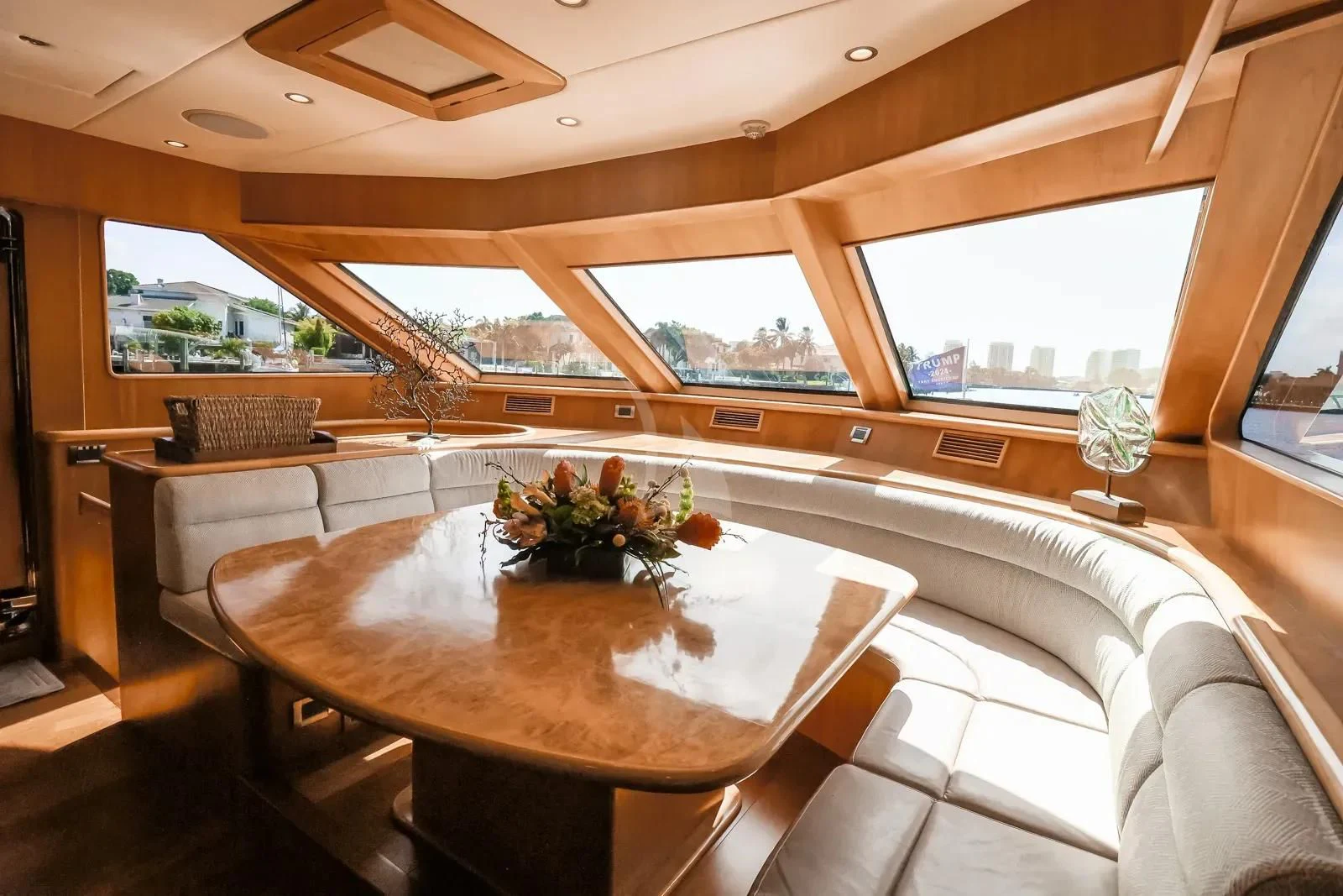 a dining table in a room aboard ANDIAMO Yacht for Charter