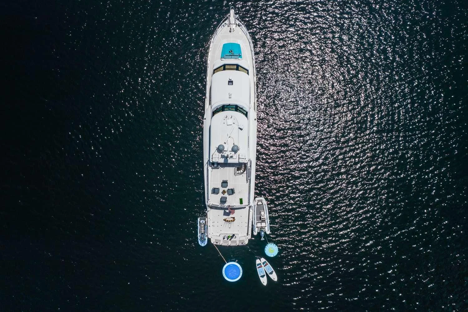 a white boat in the water aboard ANDIAMO Yacht for Charter