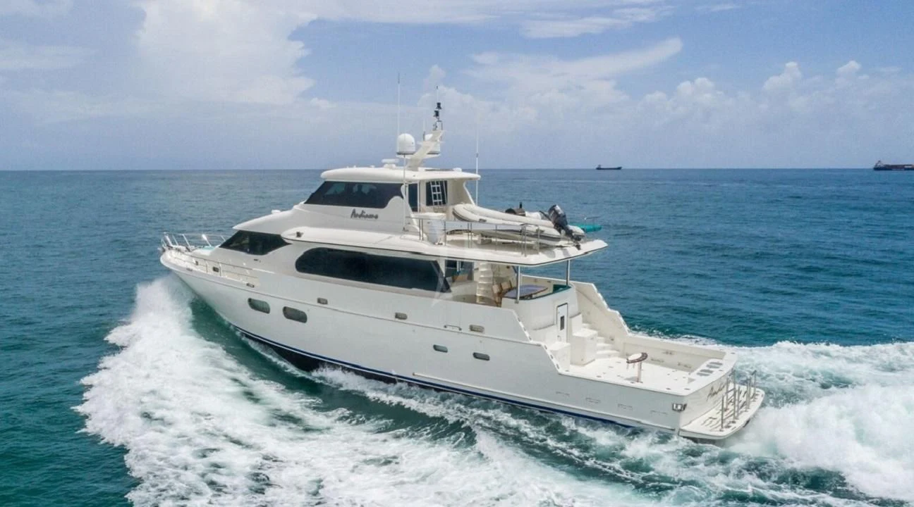 a white yacht on the water aboard ANDIAMO Yacht for Charter
