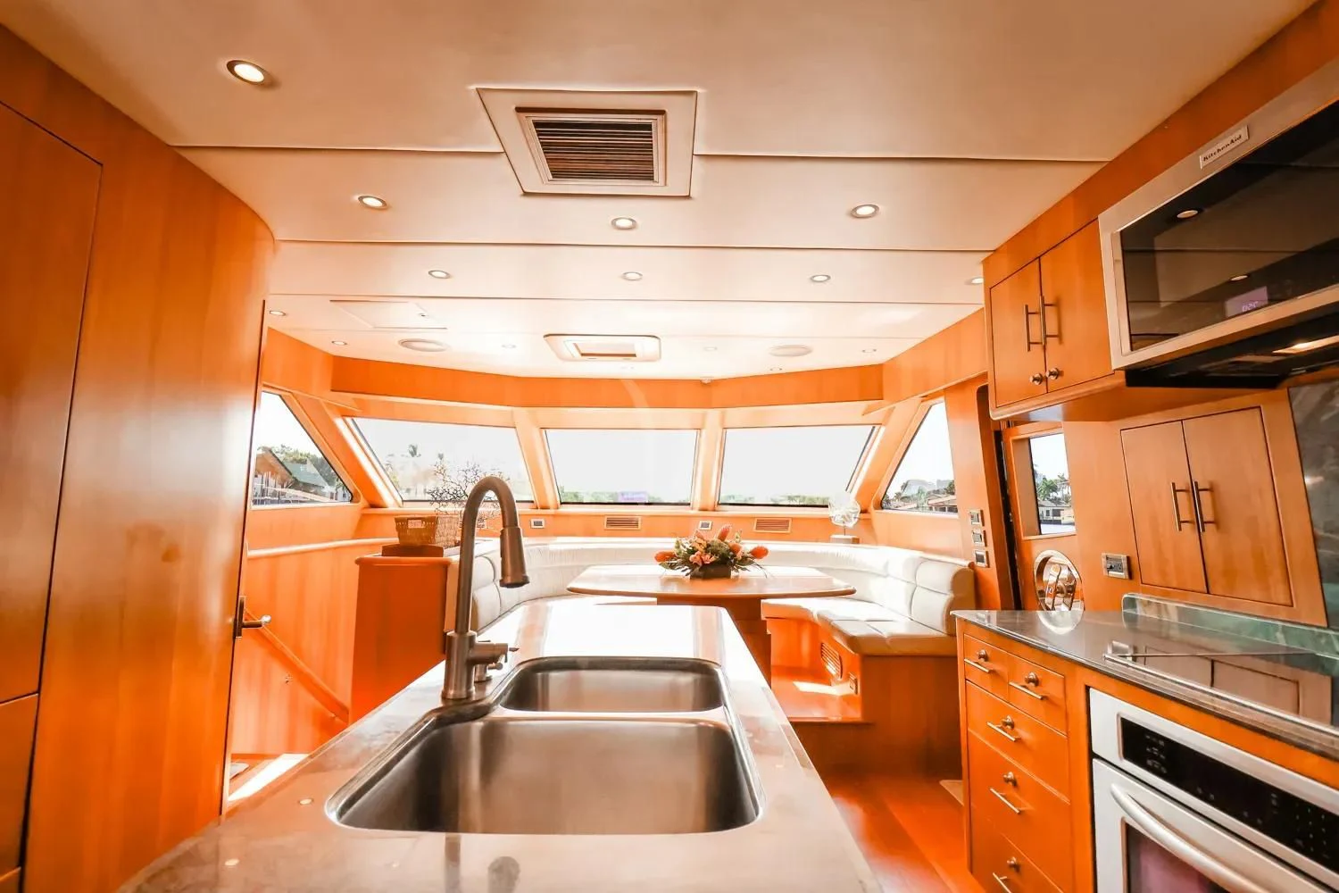 a kitchen with a sink and cabinets aboard ANDIAMO Yacht for Charter