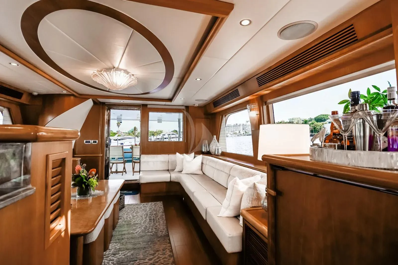 a room with a table and chairs aboard ANDIAMO Yacht for Charter