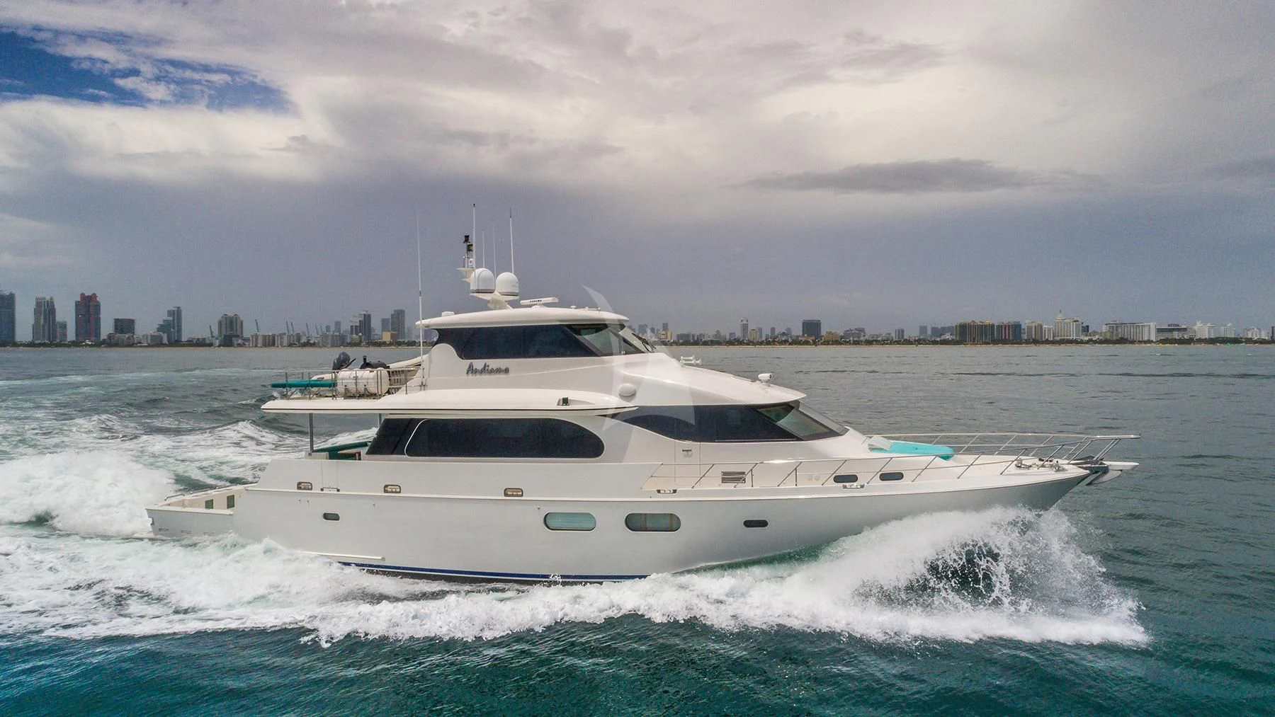 a white yacht on the water aboard ANDIAMO Yacht for Charter
