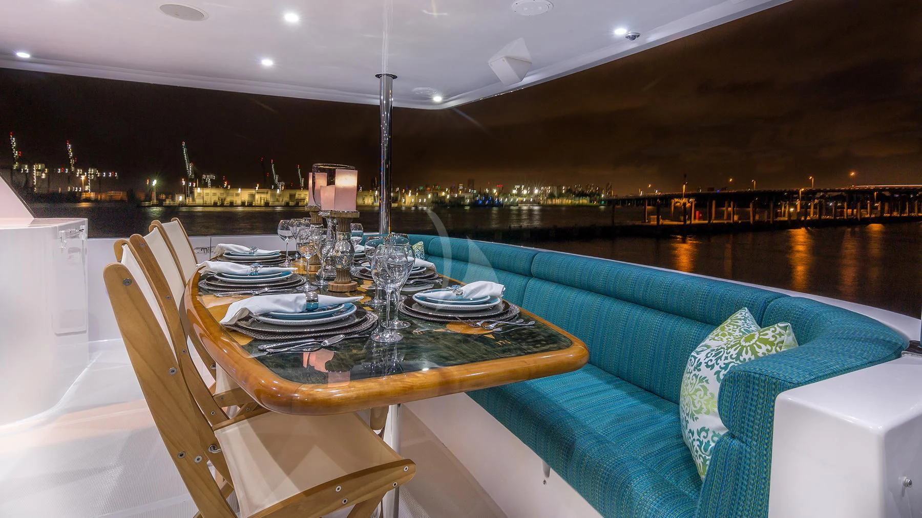 a table set for a dinner party aboard ANDIAMO Yacht for Charter