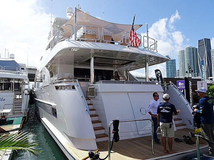 a boat docked at a pier aboard PATRIOT Yacht for Sale