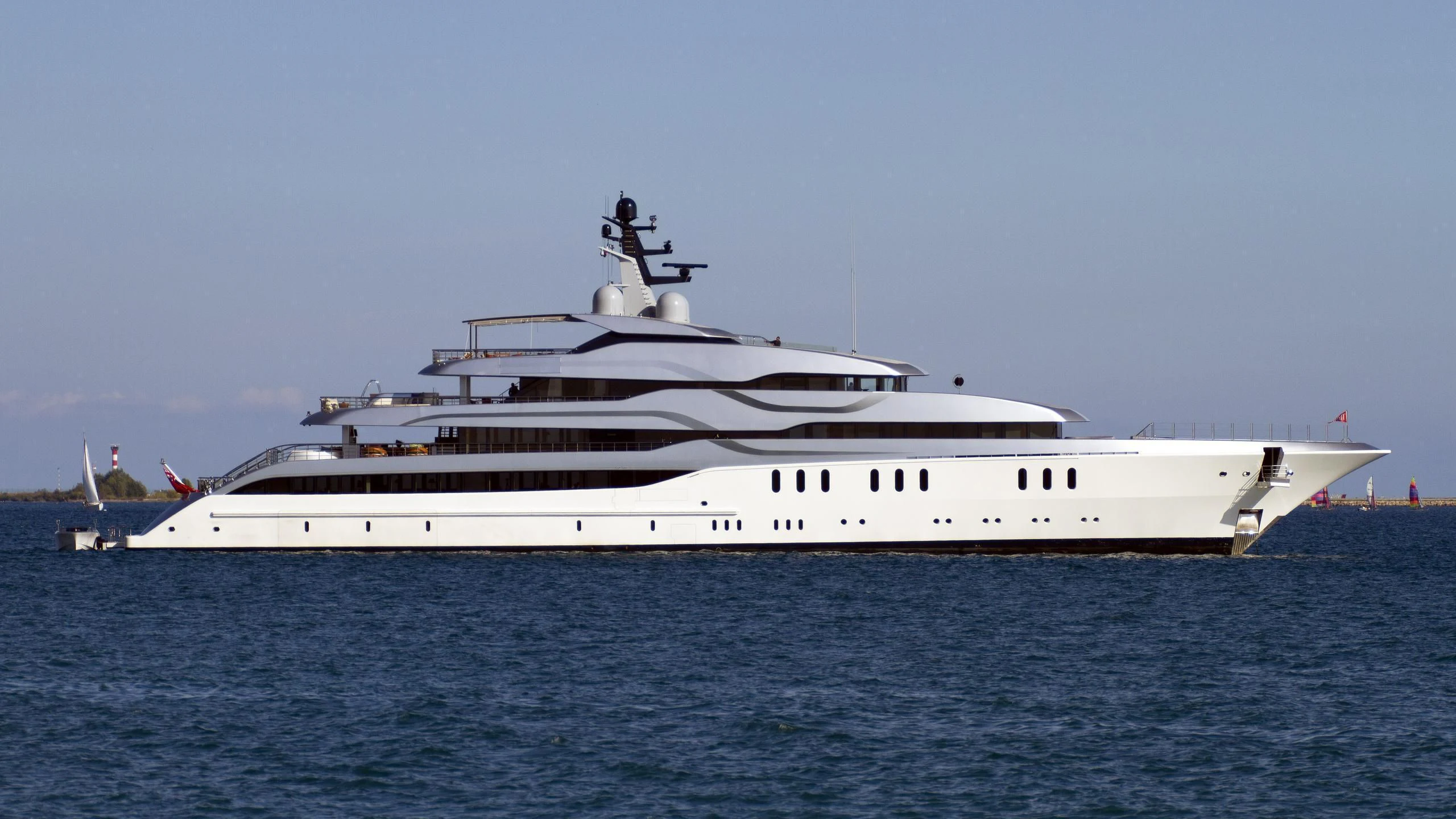 a white yacht on the water aboard TANGO Yacht for Sale
