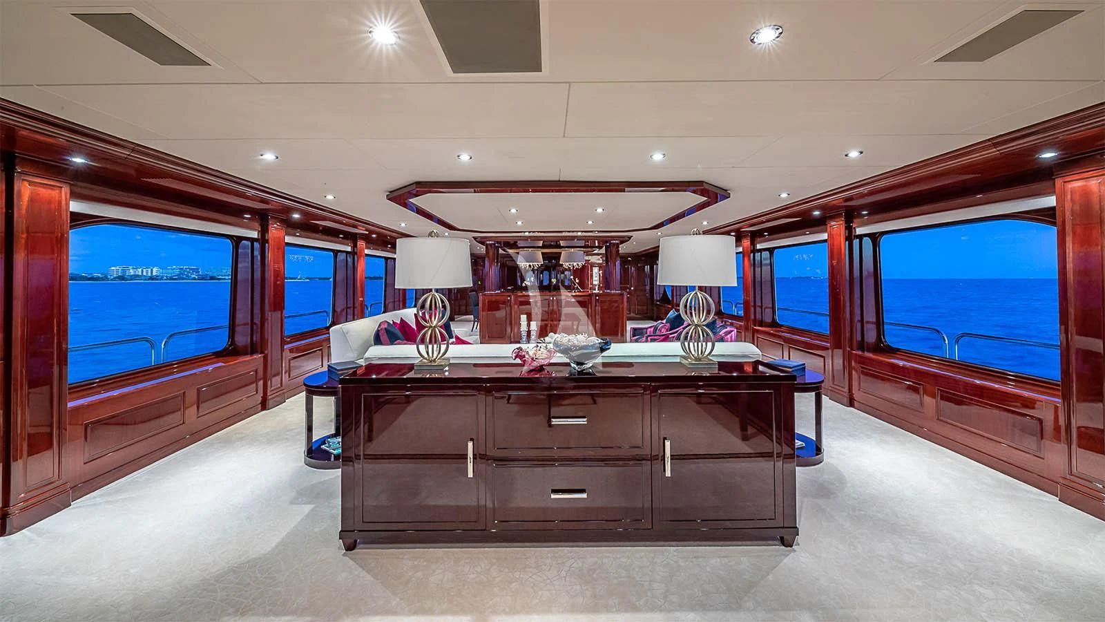 a room with a desk and a large window aboard CARTE BLANCHE Yacht for Charter