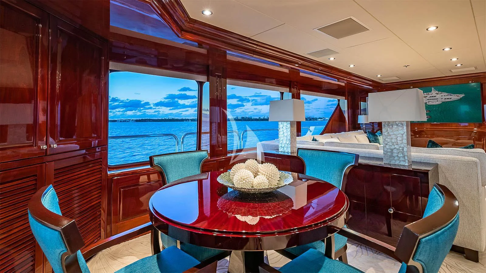 a room with a table and chairs aboard CARTE BLANCHE Yacht for Charter