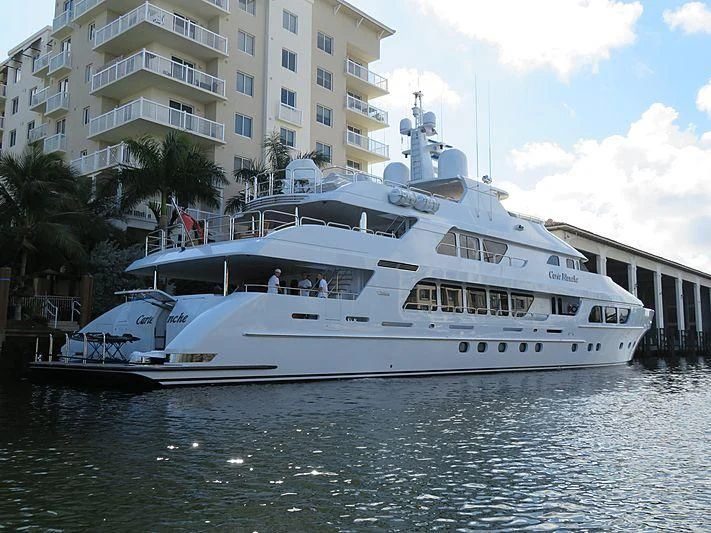 a large white boat in the water aboard CARTE BLANCHE Yacht for Charter