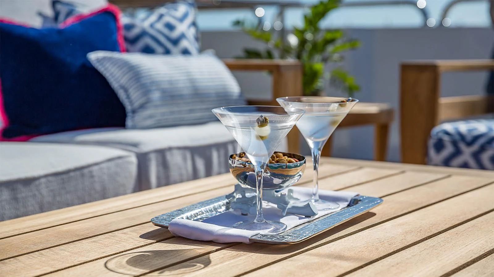 a glass of water on a table aboard CARTE BLANCHE Yacht for Charter