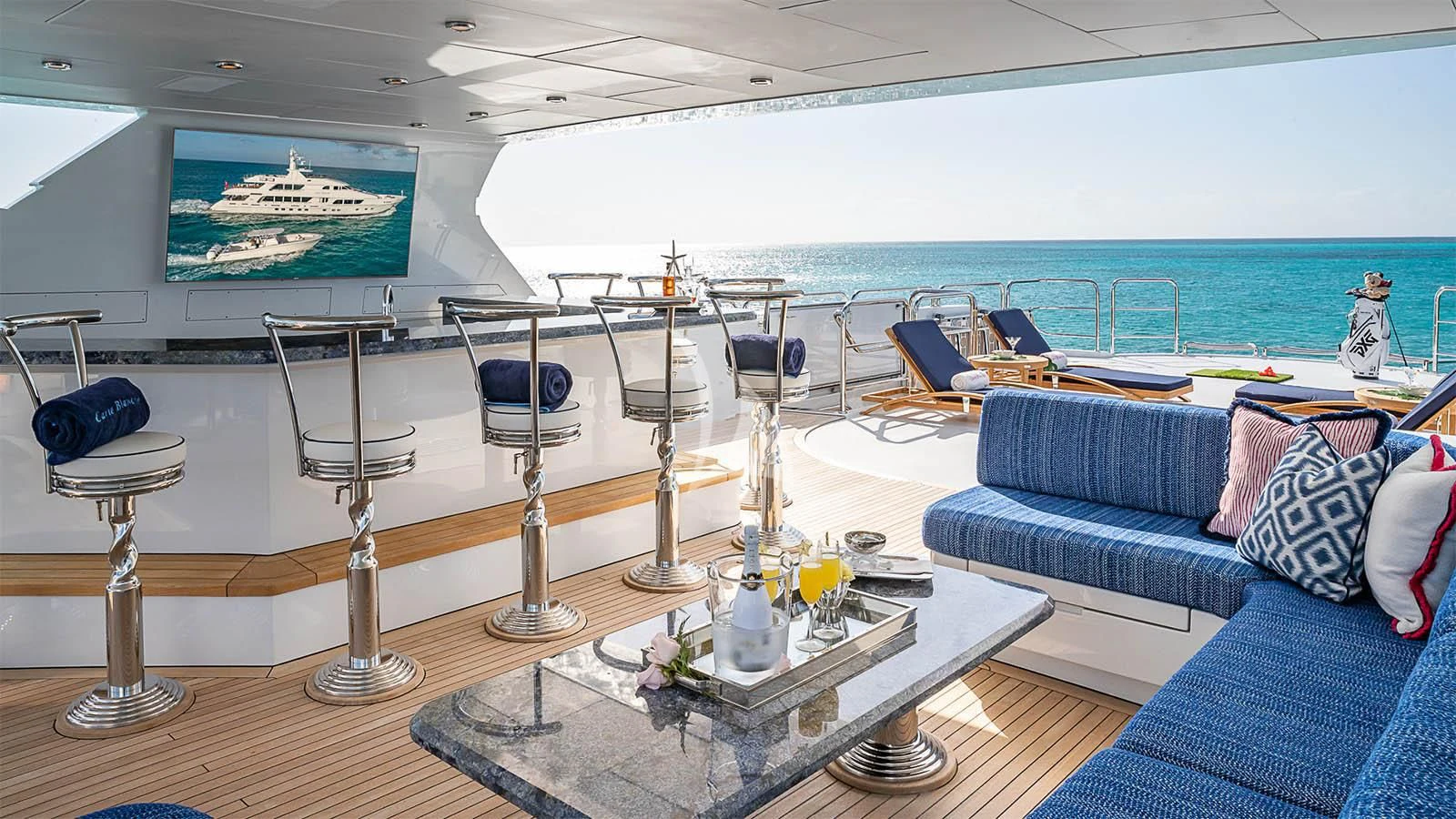 a living room with a large pool aboard CARTE BLANCHE Yacht for Charter