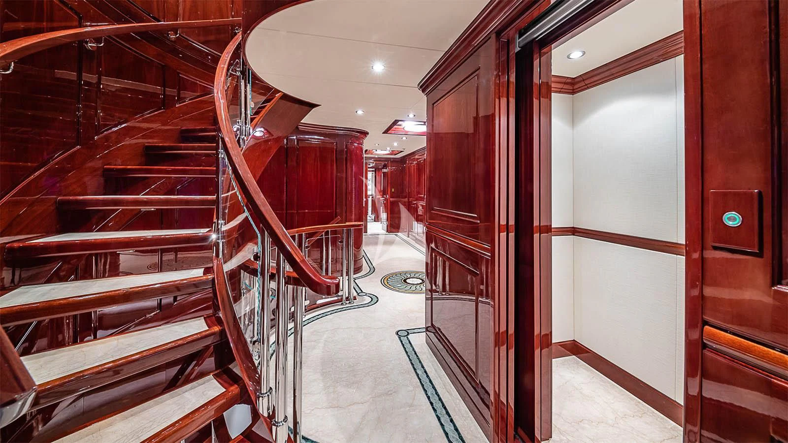 a hallway with red railings aboard CARTE BLANCHE Yacht for Charter