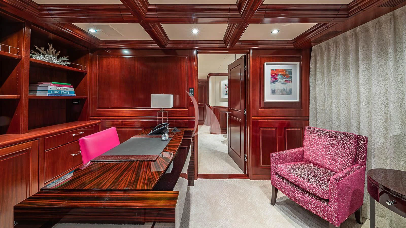 a room with a table and chairs aboard CARTE BLANCHE Yacht for Charter