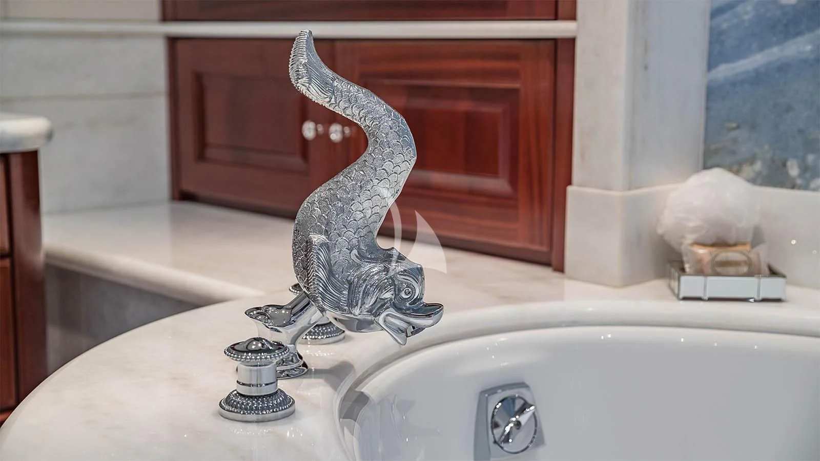 a water fountain in a bathroom aboard CARTE BLANCHE Yacht for Charter