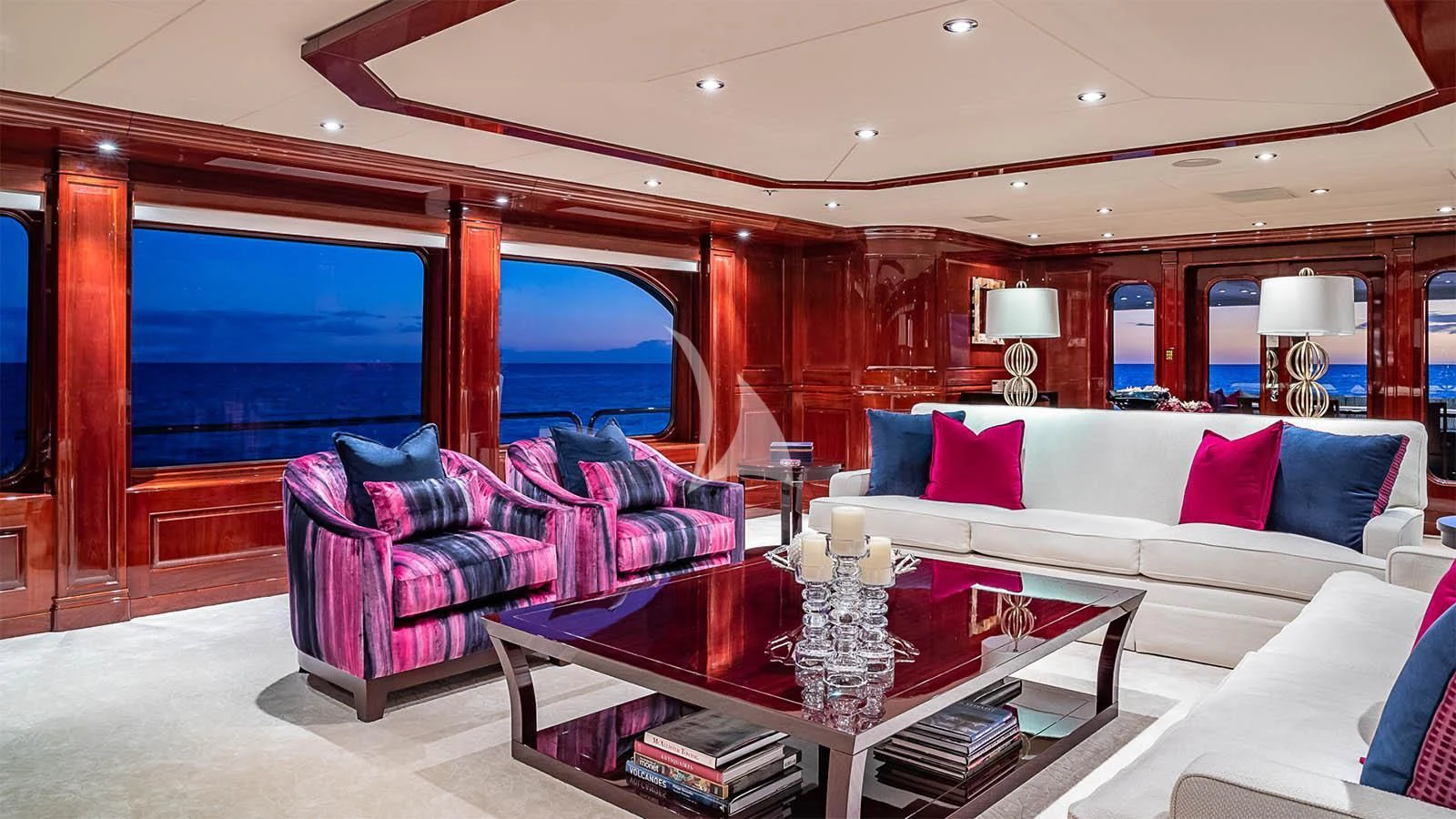 a living room with a large window aboard CARTE BLANCHE Yacht for Charter