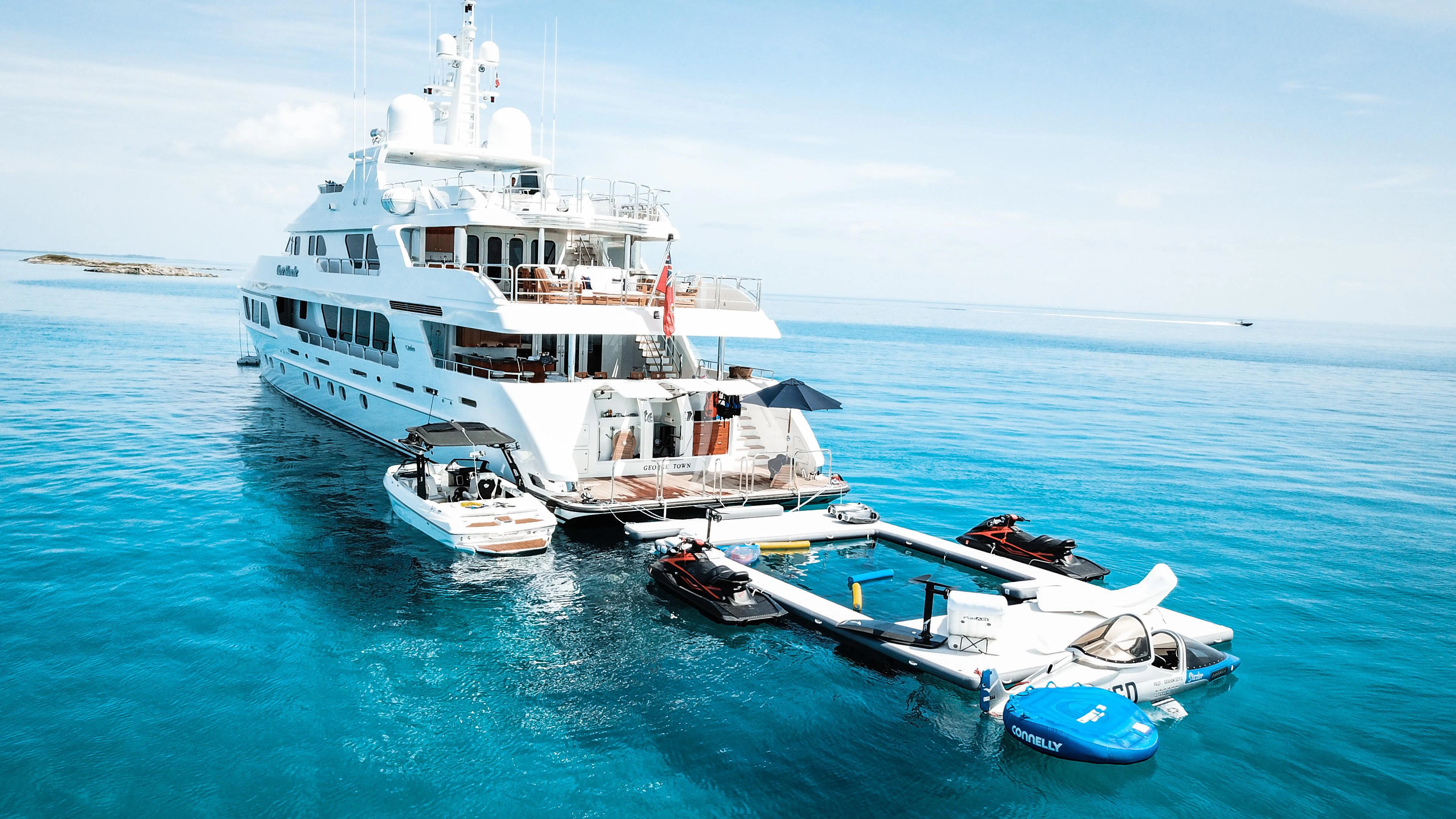 a couple of boats in the water aboard CARTE BLANCHE Yacht for Charter