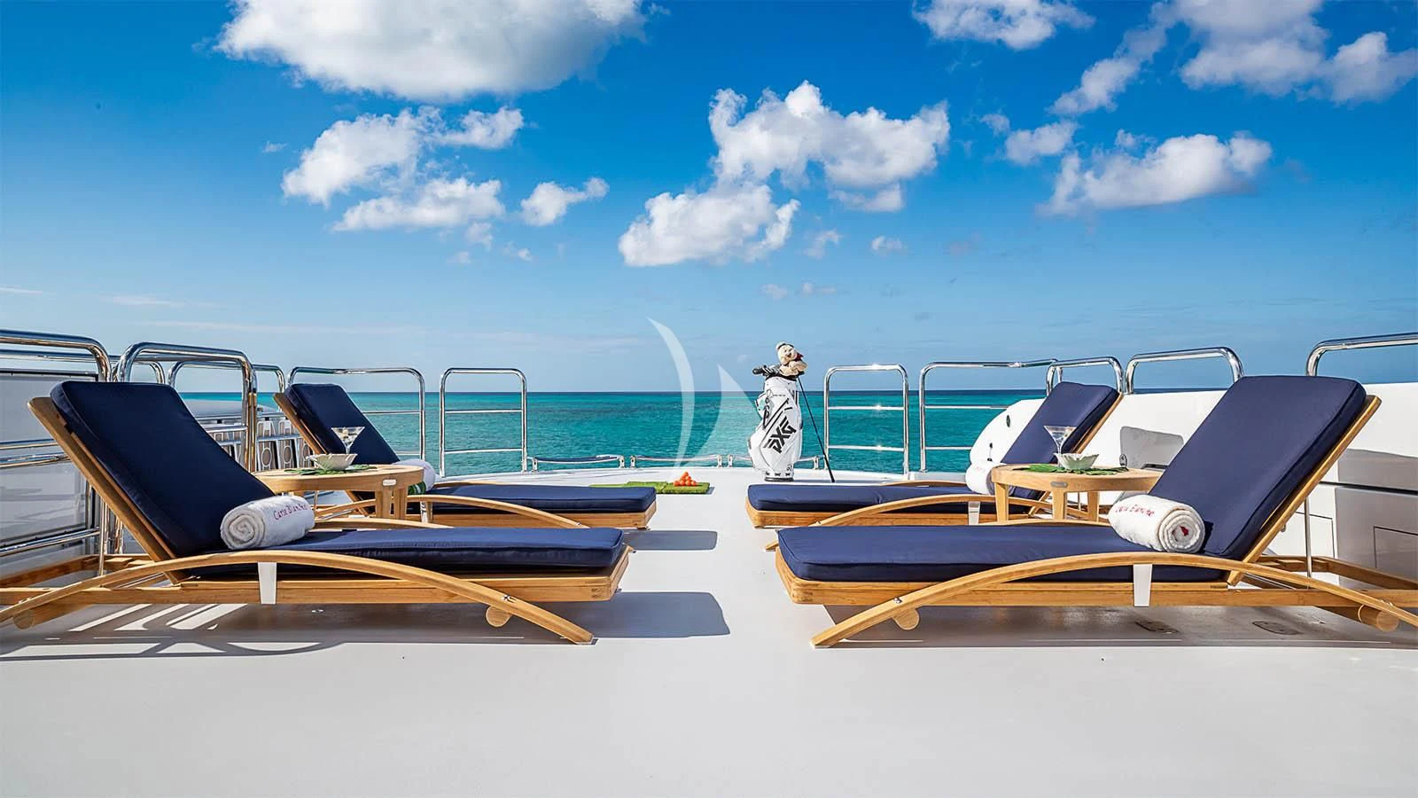 a row of boats on a beach aboard CARTE BLANCHE Yacht for Charter