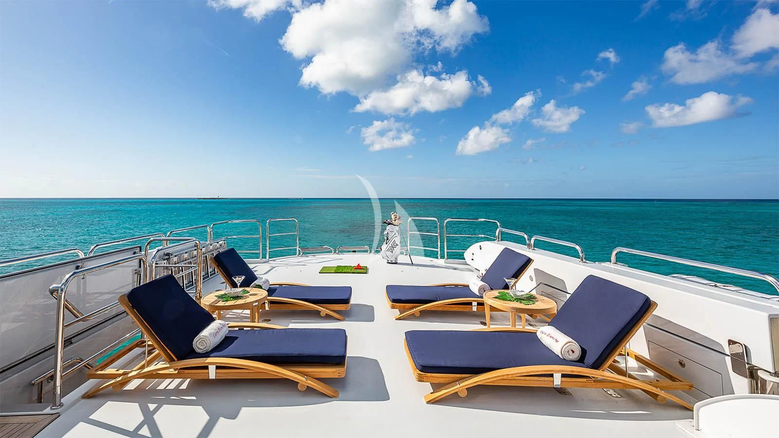 a deck with chairs and a pool aboard CARTE BLANCHE Yacht for Charter