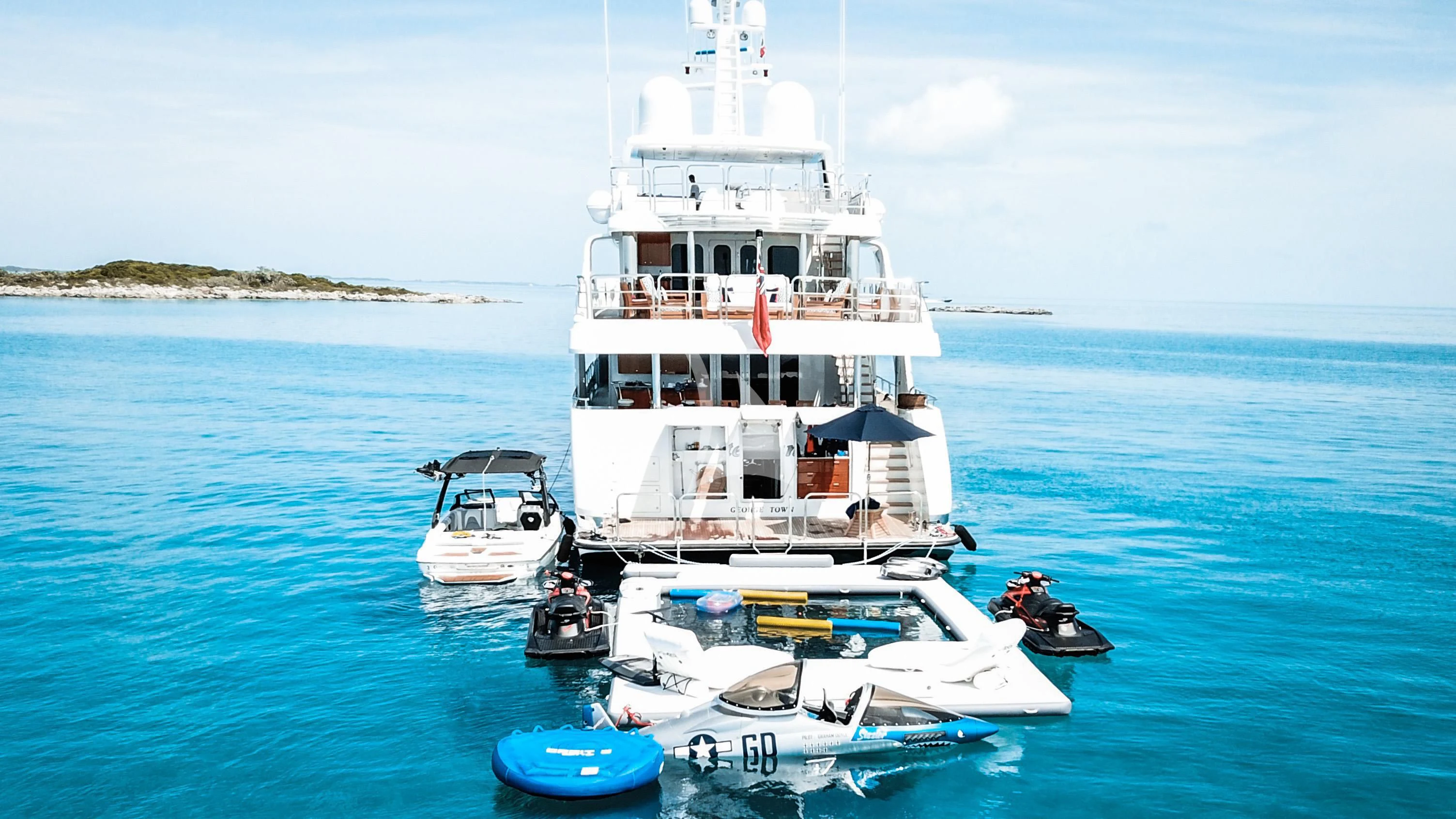 a group of boats in the water aboard CARTE BLANCHE Yacht for Charter