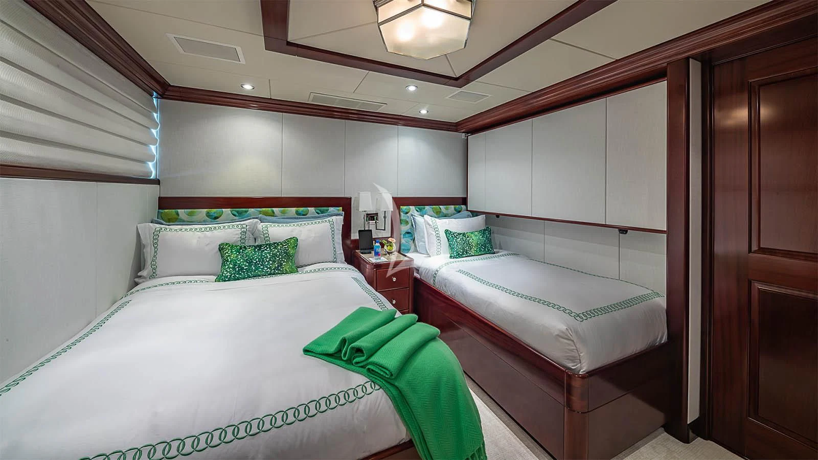 a room with two beds aboard CARTE BLANCHE Yacht for Charter