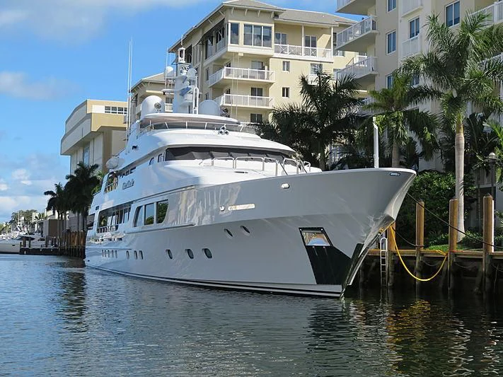 a large white boat docked aboard CARTE BLANCHE Yacht for Charter