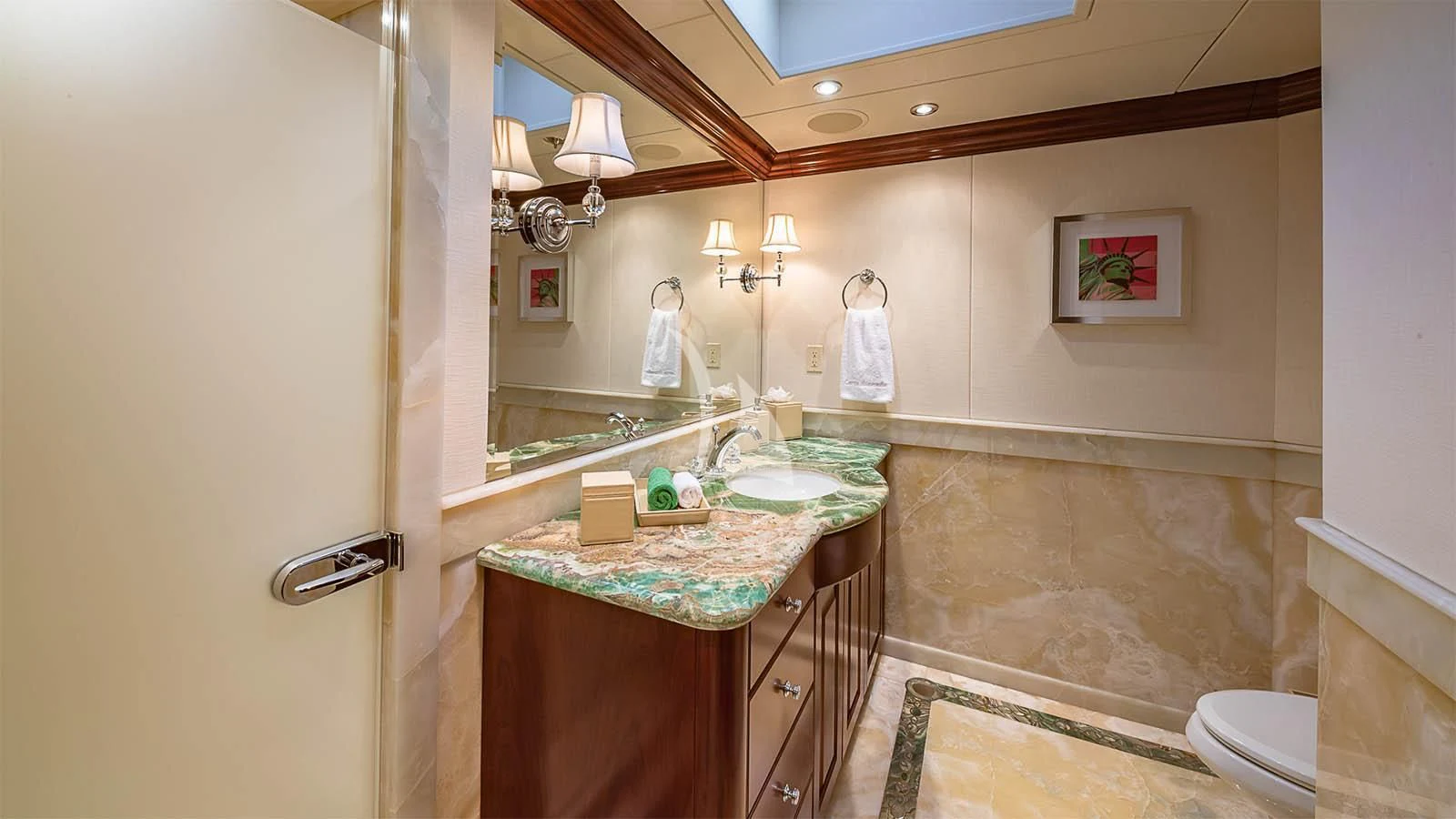 a bathroom with a marble counter top aboard CARTE BLANCHE Yacht for Charter
