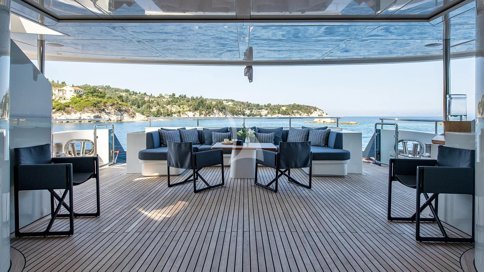 a room with a table and chairs aboard ZIA Yacht for Sale