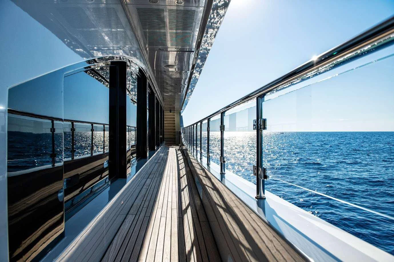 a wooden walkway over water aboard ZIA Yacht for Sale