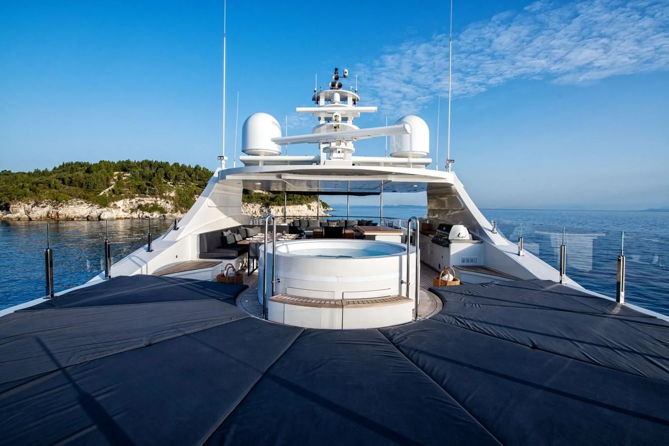 a large white boat on a dock aboard ZIA Yacht for Sale