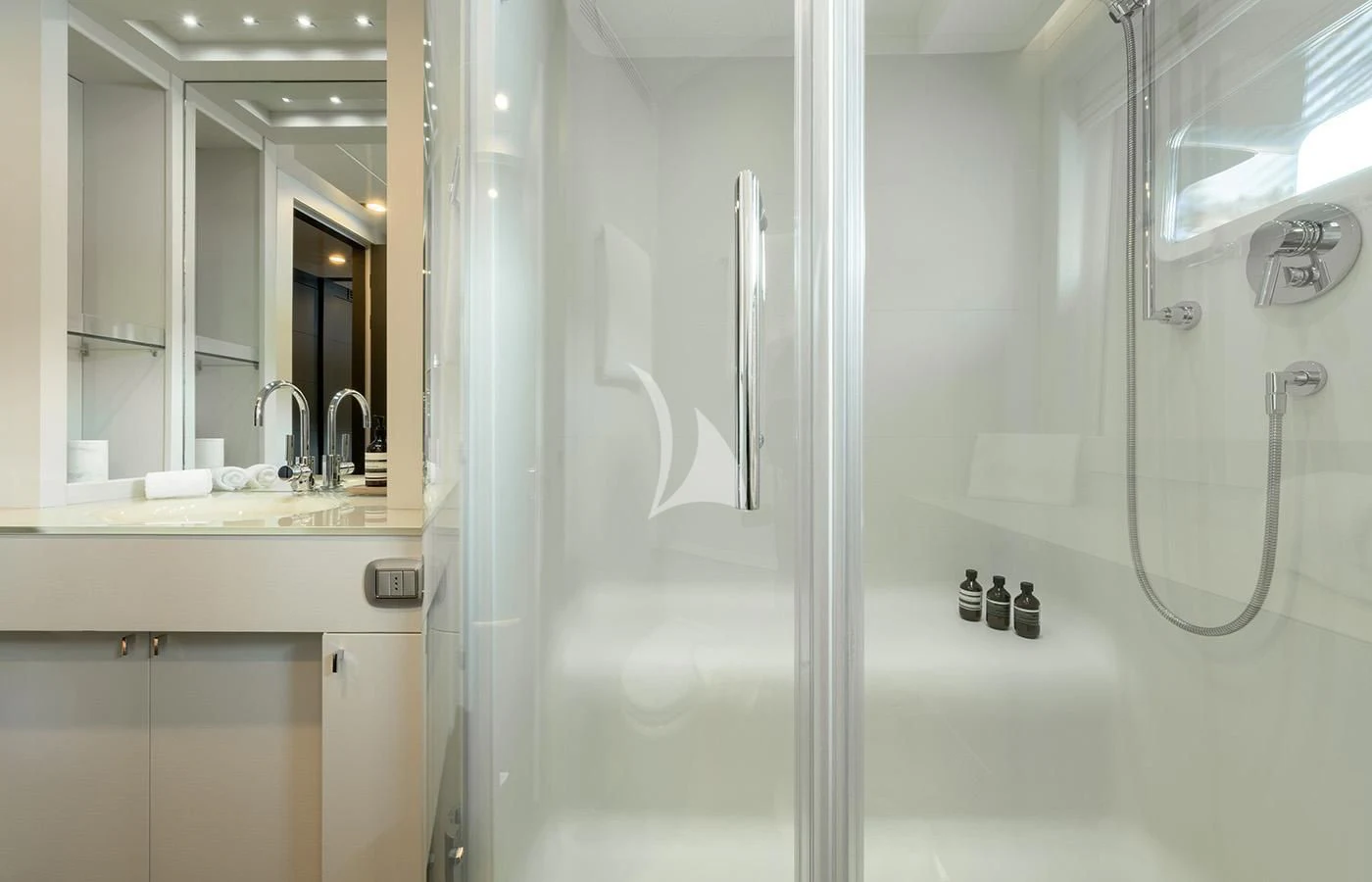 a bathroom with a glass shower aboard ZIA Yacht for Sale