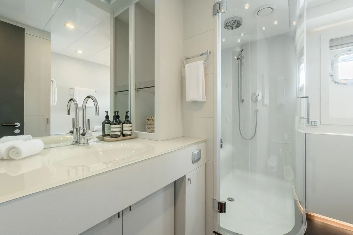 a bathroom with a shower and sink aboard ZIA Yacht for Sale