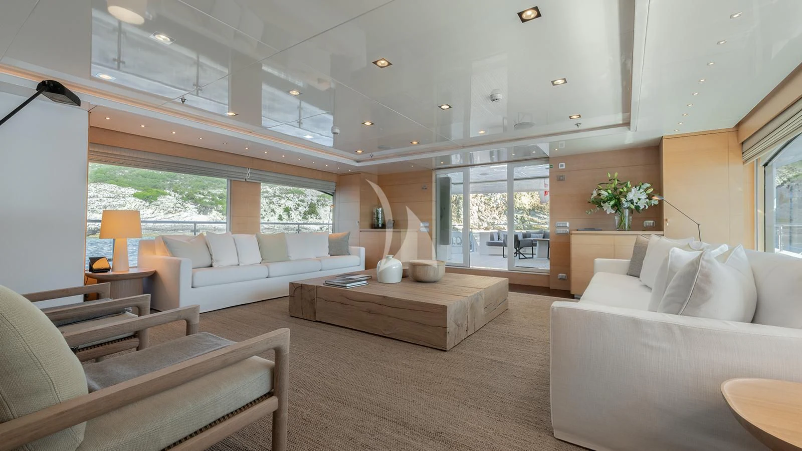 a living room with a large window aboard ZIA Yacht for Sale