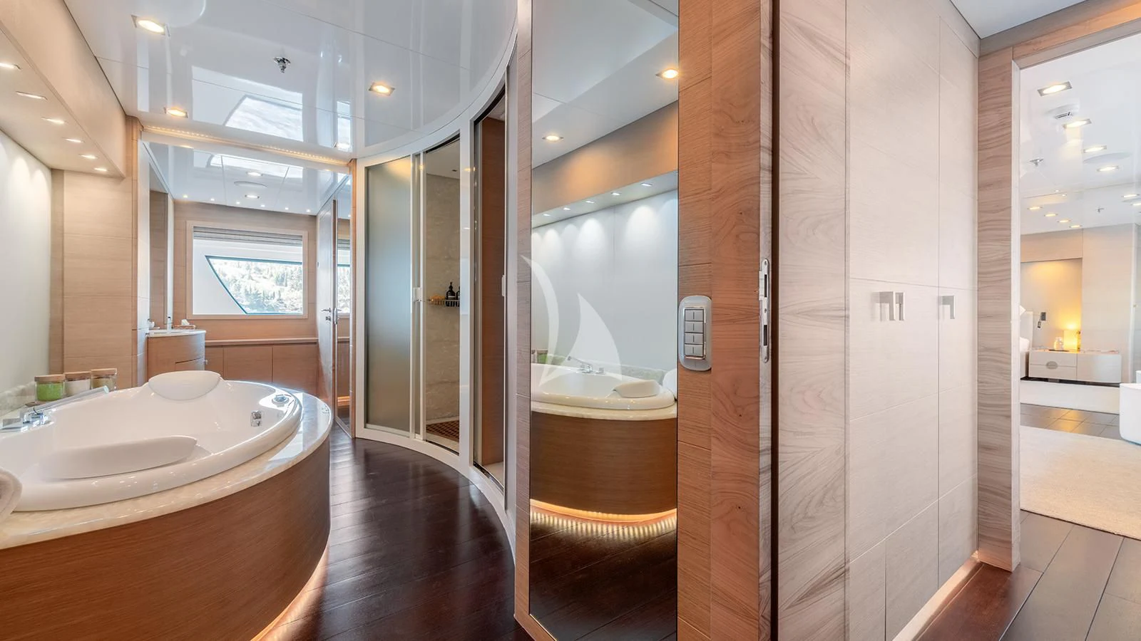 a bathroom with a large mirror aboard ZIA Yacht for Sale