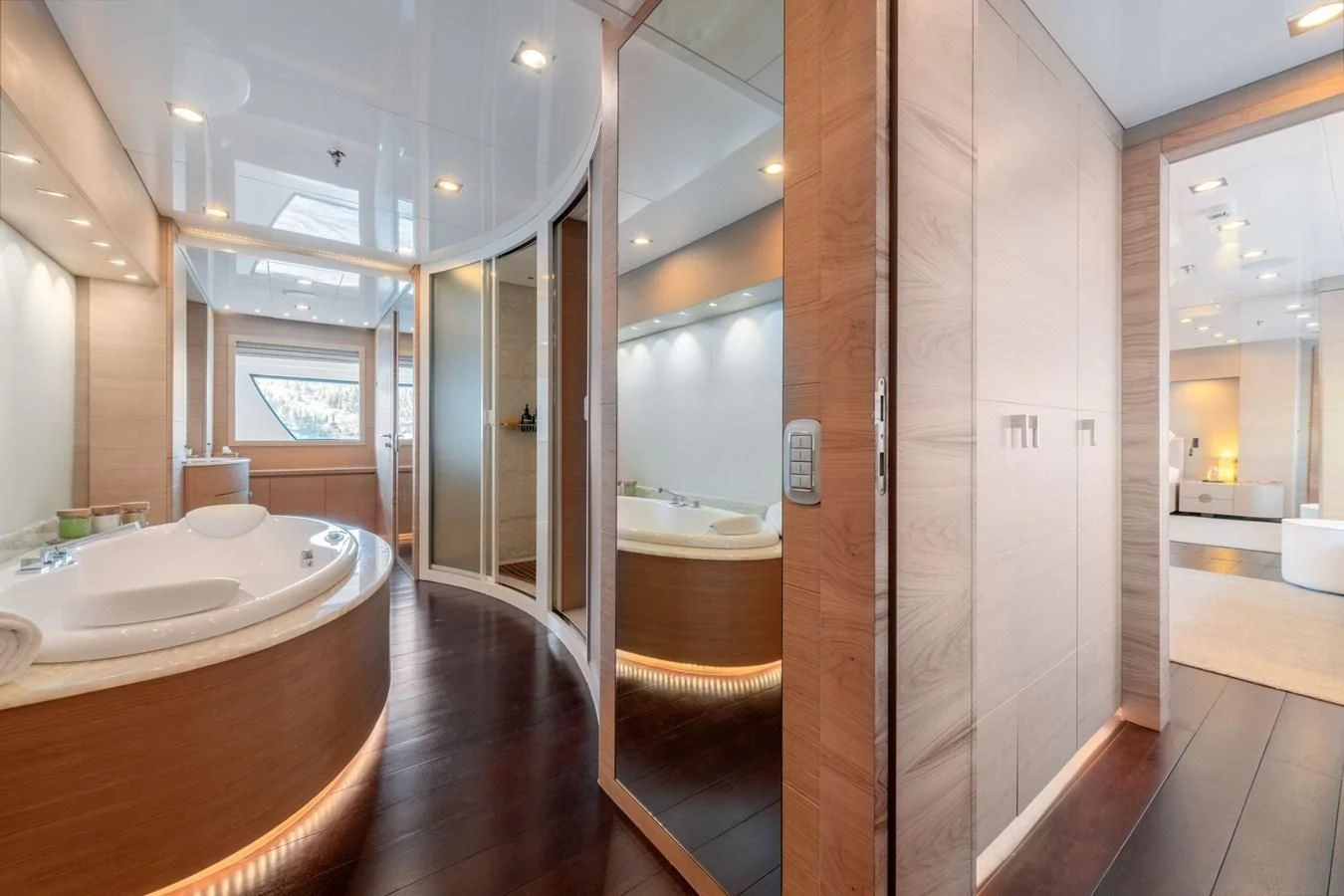 a bathroom with a large mirror aboard ZIA Yacht for Sale