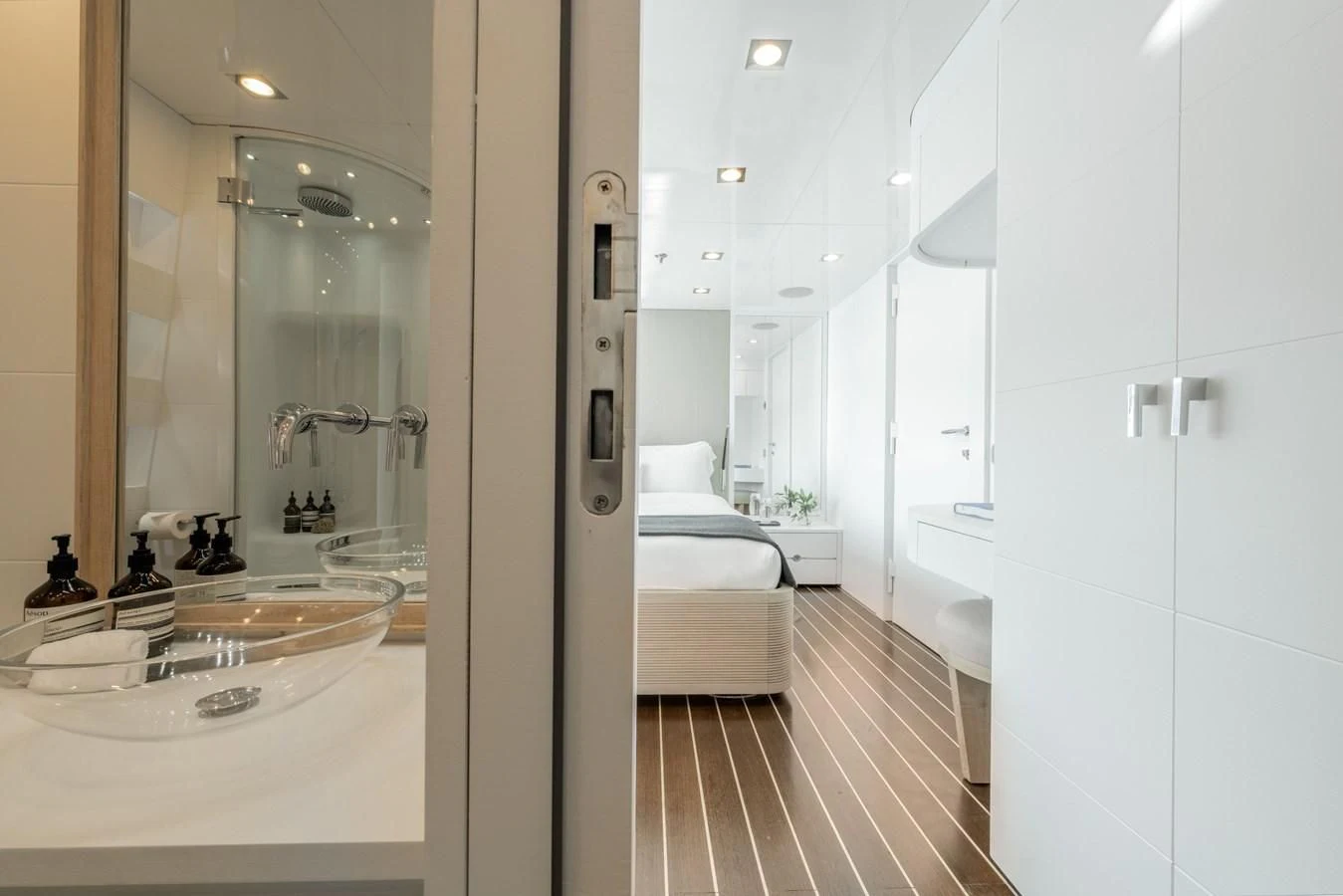 a bathroom with a large mirror aboard ZIA Yacht for Sale