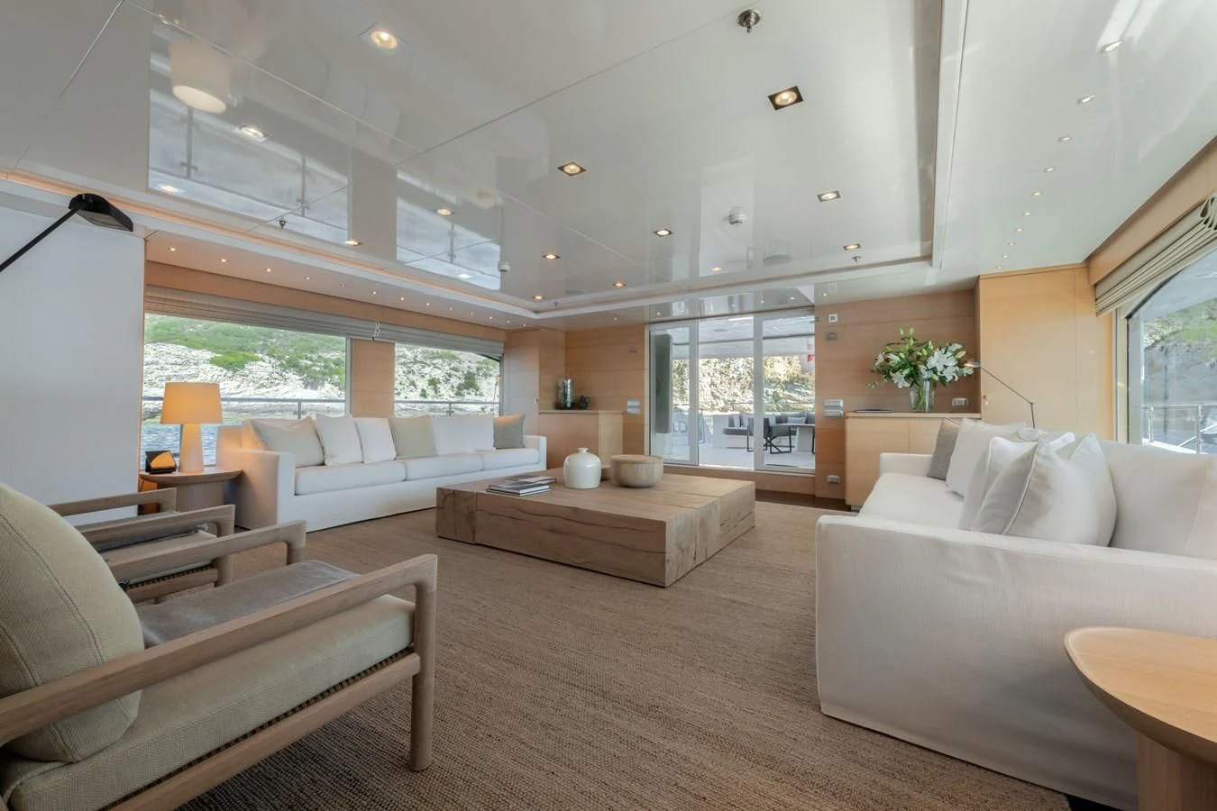 a living room with a large open window aboard ZIA Yacht for Sale