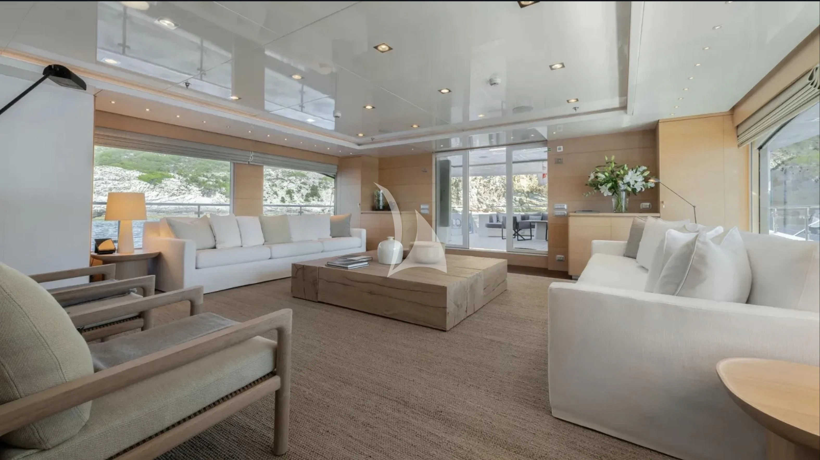 a living room with a large window aboard ZIA Yacht for Sale