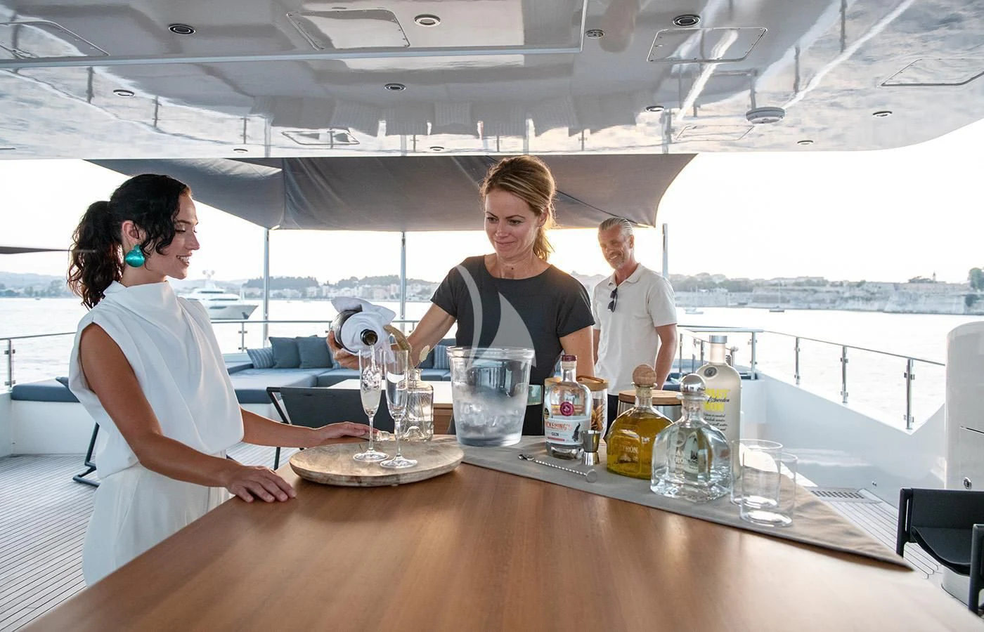 a group of people at a table aboard ZIA Yacht for Sale
