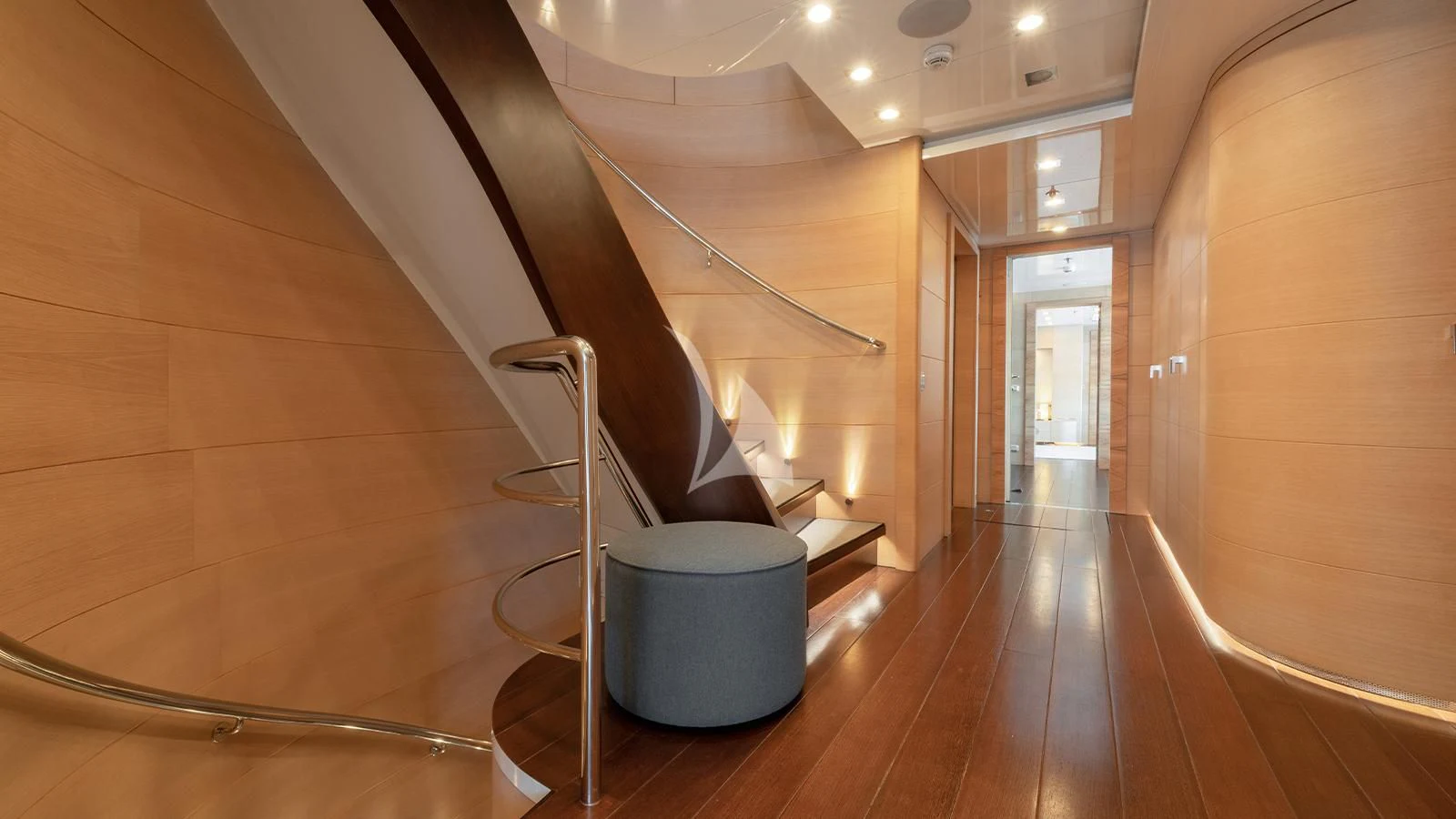 a staircase with a metal railing aboard ZIA Yacht for Sale