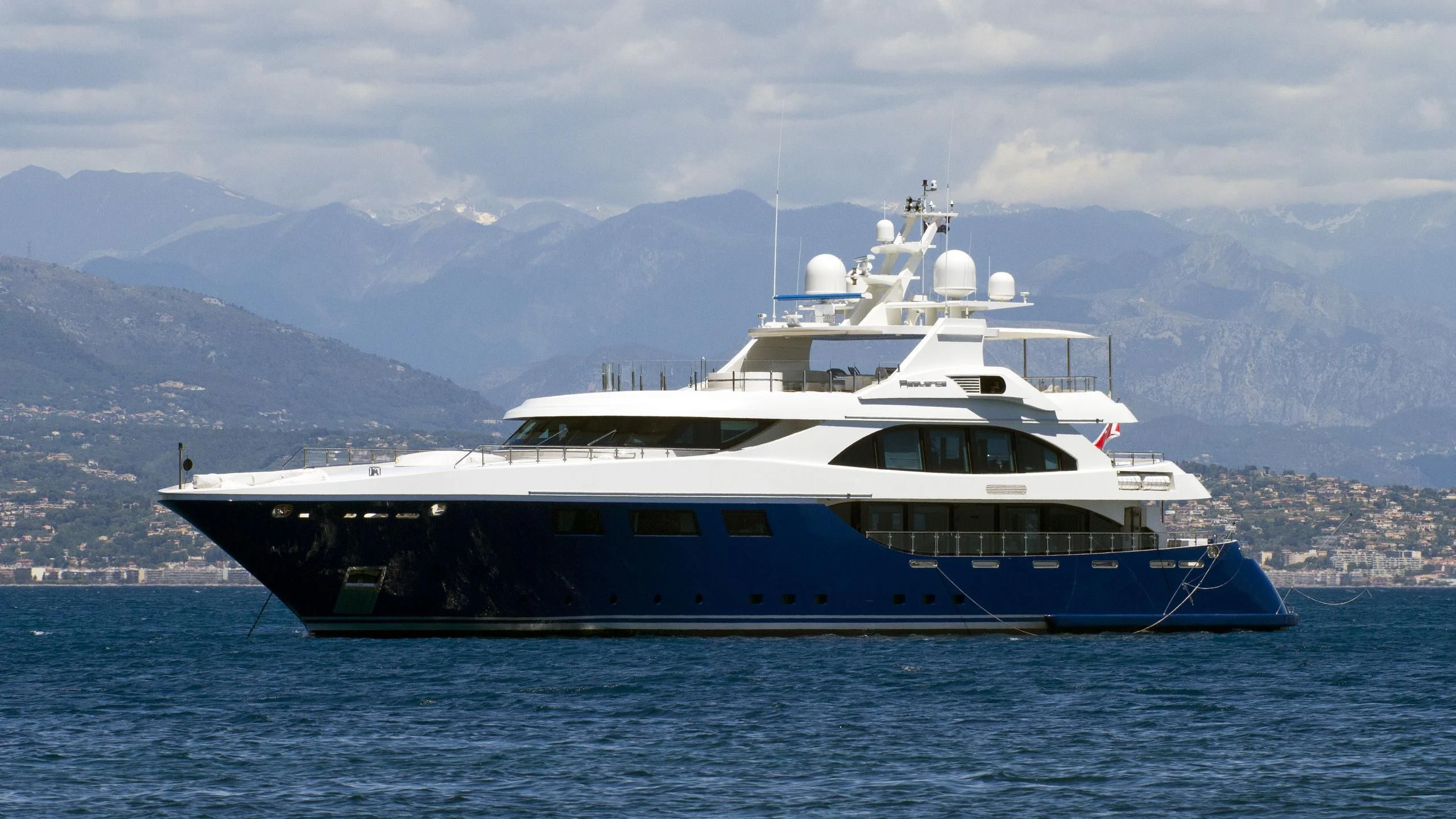 a large white boat in the water aboard ZIA Yacht for Sale