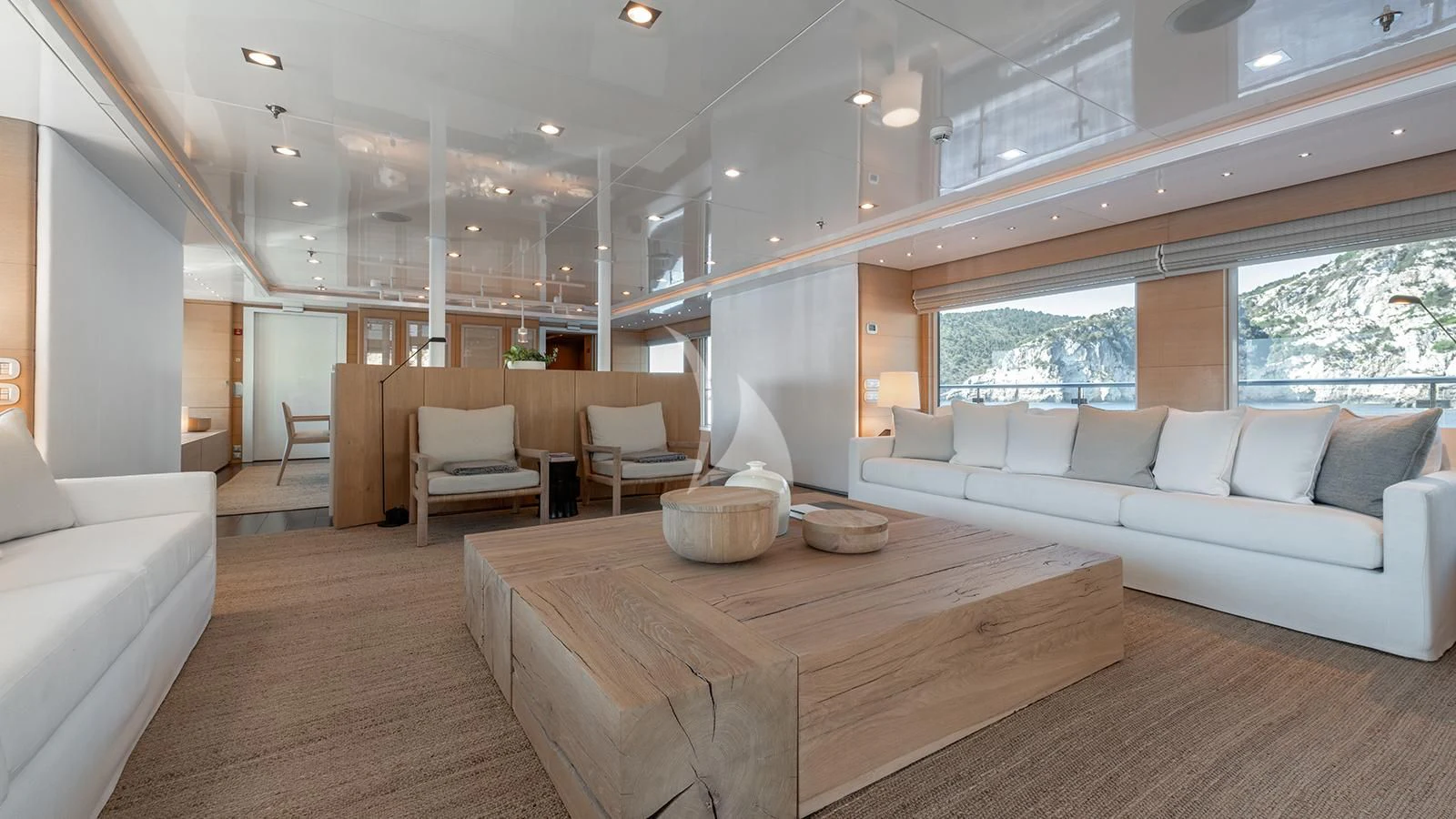 a living room with a couch and a table aboard ZIA Yacht for Sale