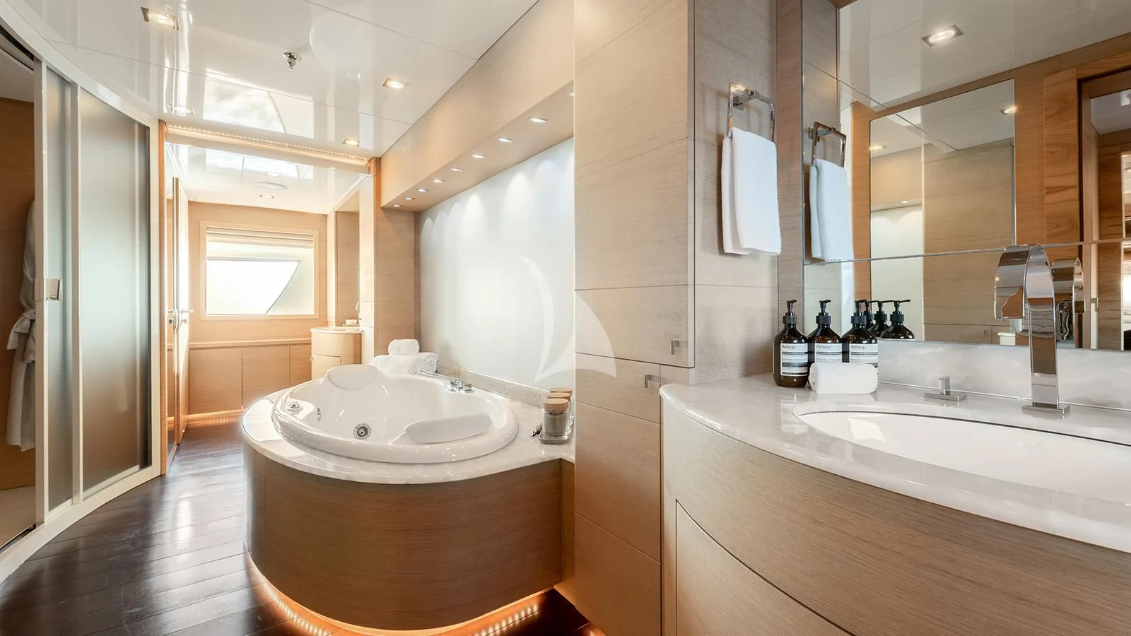 a bathroom with a large mirror aboard ZIA Yacht for Sale