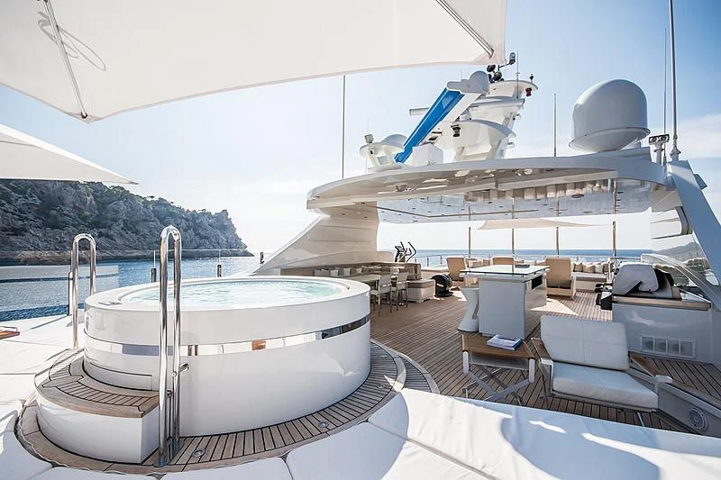 a boat docked at a pier aboard ZIA Yacht for Sale