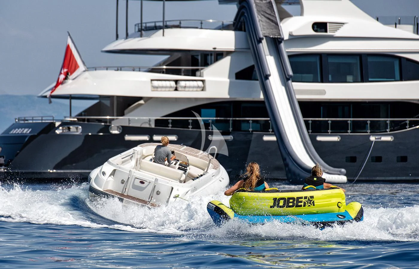 people on a raft in the water aboard ZIA Yacht for Sale