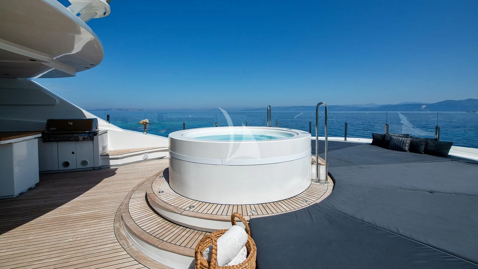 a large white boat on a deck aboard ZIA Yacht for Sale