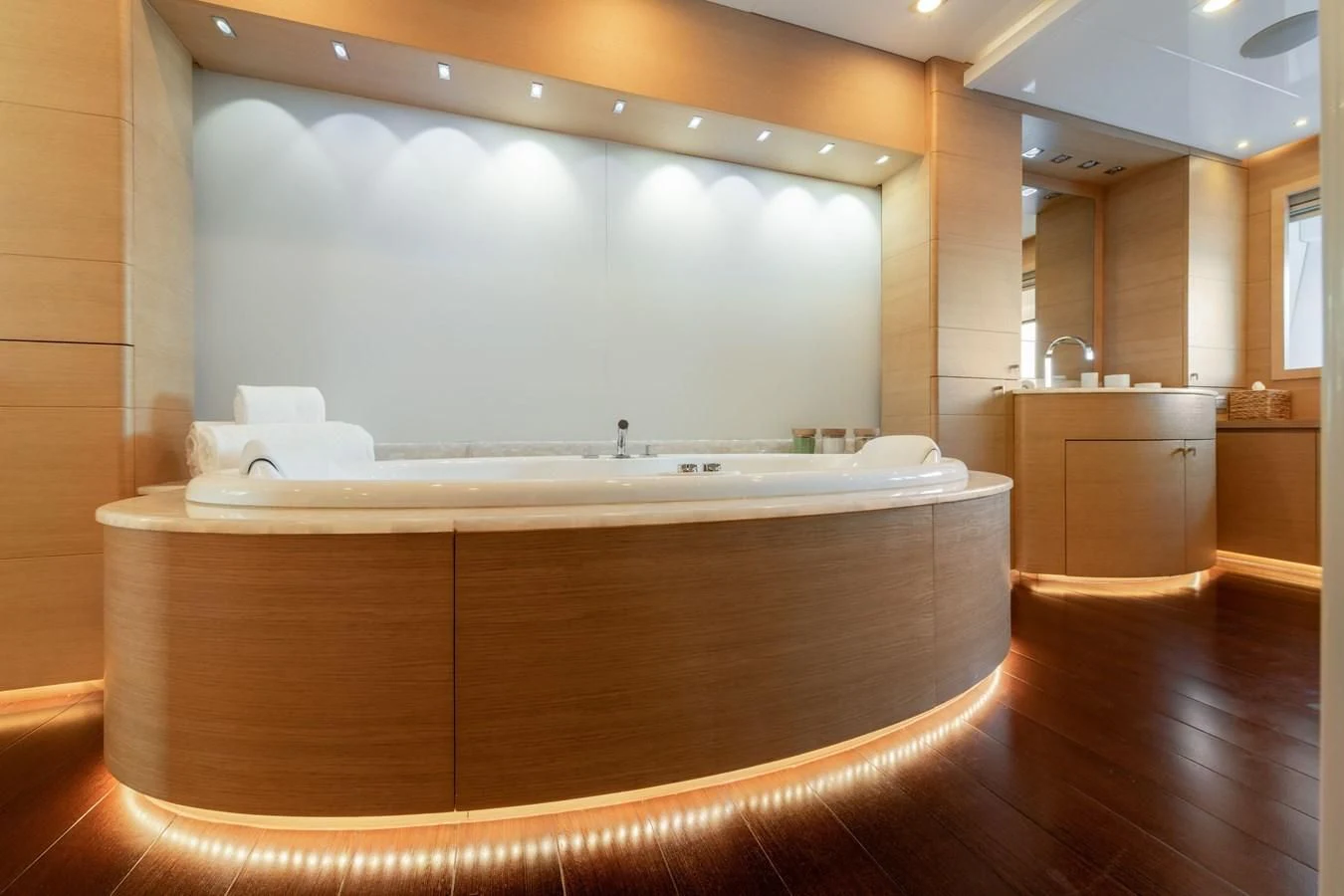 a bathroom with a large mirror aboard ZIA Yacht for Sale