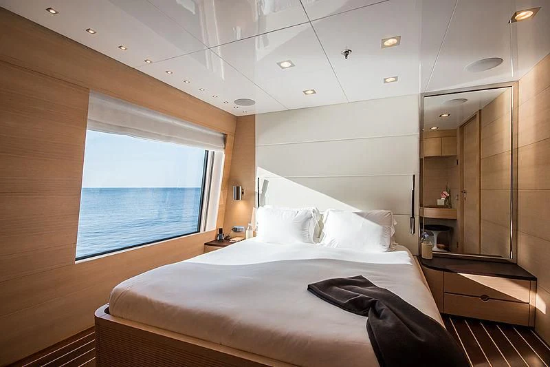 a bed in a room aboard ZIA Yacht for Sale