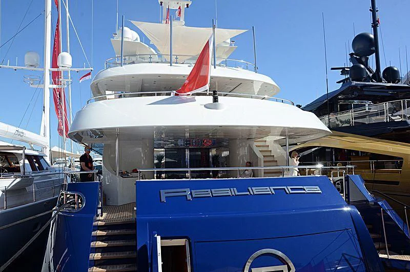a boat with a red and white stripe on the front aboard ZIA Yacht for Sale