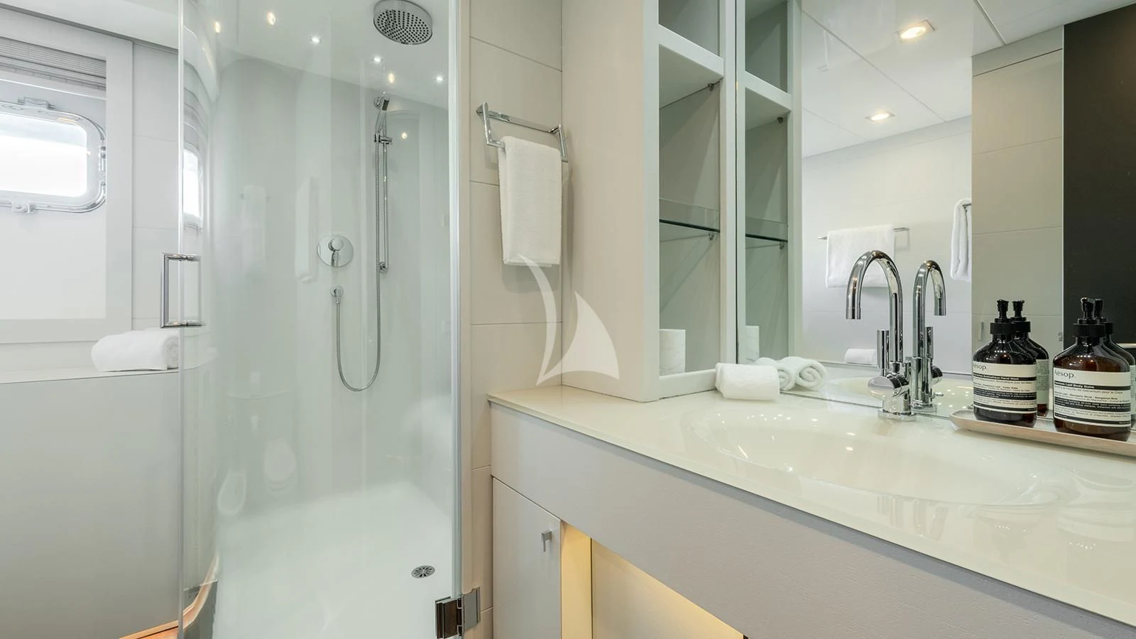 a bathroom with a shower and sink aboard ZIA Yacht for Sale