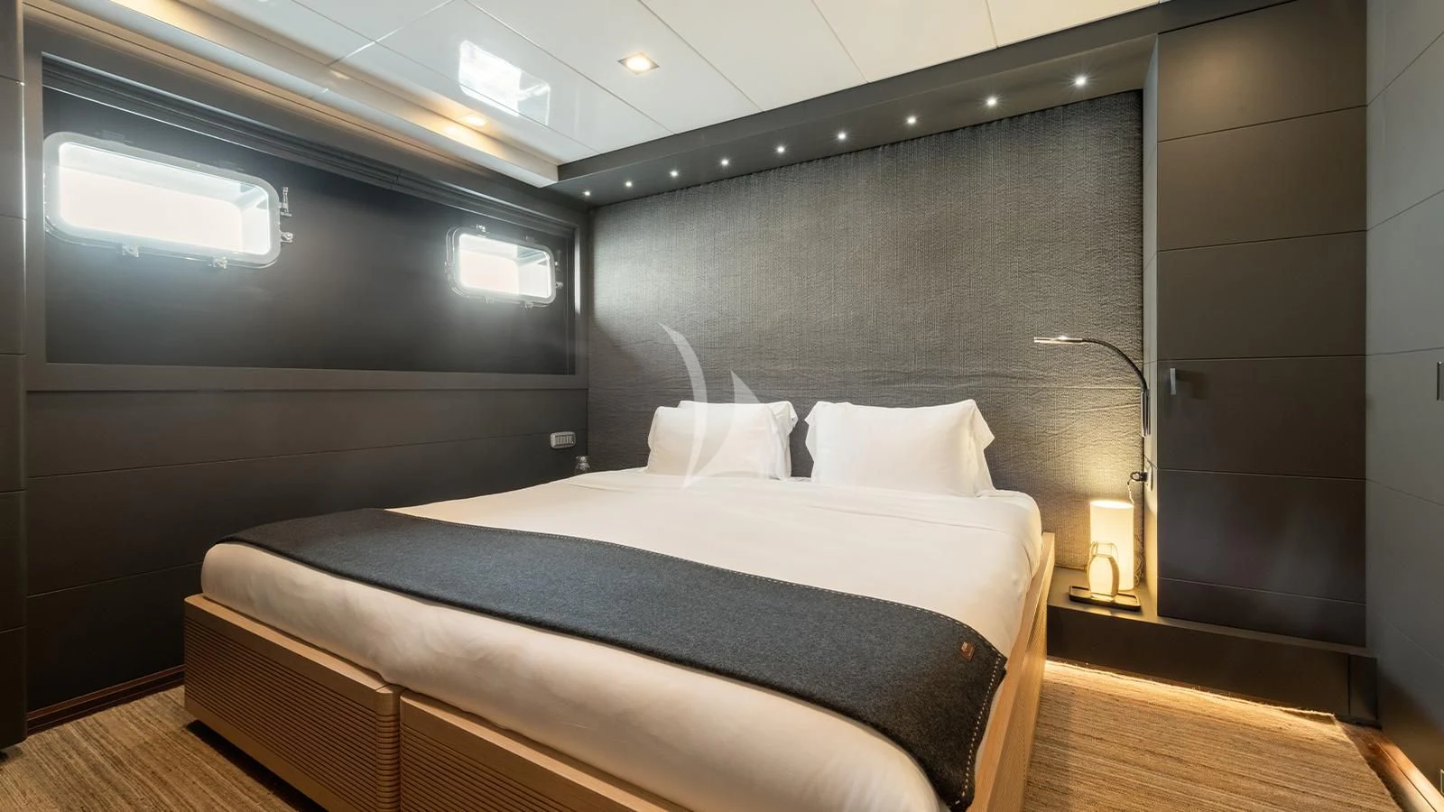 a bed in a room aboard ZIA Yacht for Sale
